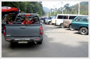 Kid on pickup truck, Wang Prachan